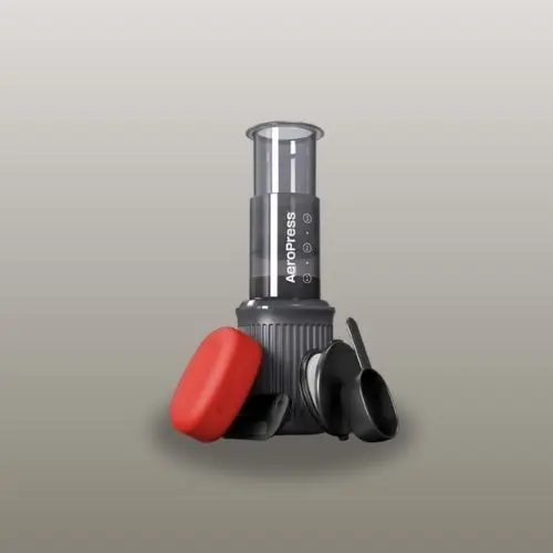 AeroPress Go portable coffee maker with travel mug